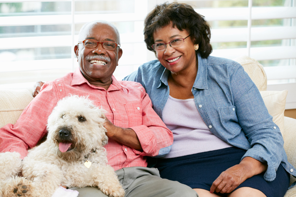 elder couple with dog